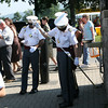 SmugMug > keywords > secures > A Command Brigade cadet secures her sabre prior to the Acceptance Day Parade at the United States Military Academy at West Point on Saturday, August 15, 2009. The new cadets joined their companies on the Plain and were officially welcomed into the Corps. Hudson Valley Press/CHUCK STEWART, JR.