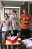 SmugMug > keywords > makeshift > Alanna, Erik, and Cole around the makeshift beer pong table - 9-7-2009