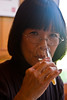 SmugMug > keywords > sip > Mother trying a very small sip of wine - 11-27-2009