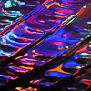 SmugMug > keywords > led > 12/27/09 - Liquid Glass
It got to be pretty late yesterday and I hadn't taken any pictures.  So, I got out some of my clear glass pieces and my handy dandy string of LED Christmas lights and set out to see what I could do.  This is part of the wing of an angel plate:-)  There are more shots here:
http://fotomom.smugmug.com/Art/Glass-Appeal-25/10765352_hUBGy#750312453_f7haF
including a set-up shot.

I had a bad cough set in last night and this morning I obviously have a cold:-(  I so wanted to make some day trips to the zoo and beach this week, but between the truly winter temps in the forecast and now this cold, I'm not sure we'll make it:-(

Thanks for sharing in our Christmas joy yesterday...

HAGD,
Maryann