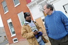 SmugMug > keywords > shea > 12-18-09 BALTIMORE, MD- R and L-  Christopher Shea, President and CEO of EBDI standing outside of their Greenhab model home at 1714 E. Chase Street in East Baltimore with neighborhood resident Jonny Coleman, who is benefiting from the home repair grant that is being offered in the area.  Photo by Maximilian Franz/ The Daily Record