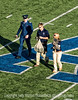 SmugMug > keywords > handler > The cadet handlers of the falcon walk off the field after the flying of the falcon at the Air Force/Army game.