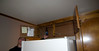 SmugMug > keywords > make > 20091116 and 20091209 Orange Man Video Shoot >  Chopped Cabinet to Make Way for Taller Refridgerator