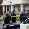 SmugMug > keywords > found > Cleveland police stand watch outside the home of Anthony Sowell on the city's east side Thursday, Nov. 5, 2009. Police are planning on a further search of the house where the remains of 11 people have been discovered.  (AP Photo/Mark Duncan)