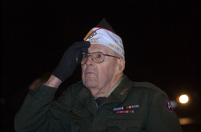  > (Chronicle file photo) Ray Church gives a final salute to the flag at the last Wellington Dukes home football game of the season in October 2009, when he was inducted into the Wellington Fullbackers Hall of Honor.