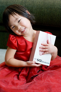  > 12-25-09 Isabella with her pink DS something she has been wanting for a long time