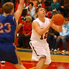 SmugMug > keywords > open > Oberlin Nick Reinhold goes to hoop past Open Door Spencer Davis Jan. 5.   Steve Manheim