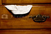 SmugMug > all-time keyword > briefs > A pair of panties sticking out of a dresser drawer.
