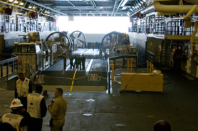  > Two LCAC hovercraft on the well deck inside of the USS Green Bay