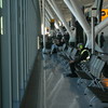 SmugMug > keywords > ready > Ready to work.  Airport worker chills out in Terminal, Heathow