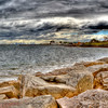 SmugMug > keywords > towards > Dave Sumner - This HDR image has been significantly reduced in size from 75Mb to 1.5 Mb for the gallery. I actually took 12 images in portrait orientation which were converted to 4 HDR images which were then stitched together. Unfortunately one of the images wouldn't line up correctly so I had to use just 2 for this shot. The shot uses the Grunge setting in Photomatix previously seen with Pete's Carriages from Werribee Mansion.

I know it is very surreal but I just love the sky effect that this setting has given the images. It was a stormy, rainy day and it is actually raining on the left hand side of the image. The shot is from Brighton beach looking back towards the city.

What do you think of the effect?