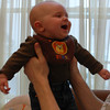 SmugMug > keywords > bradley > Cousin Bradley smiling on his Dad's lap